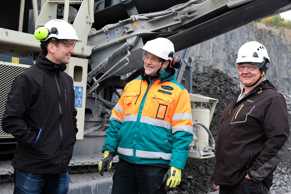 Three employees at the VRJ Group site