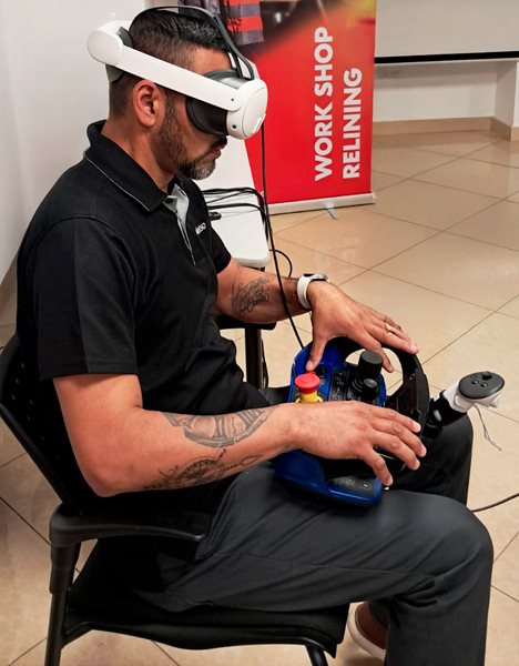 Operator completing a virtual reality (VR) training.