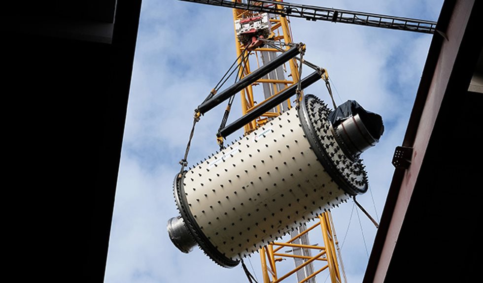 Grinding mill pictured from below as it is being lowered.