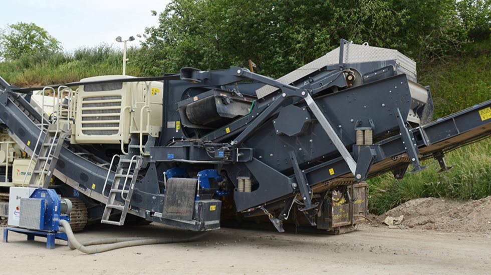 Lokotrack® LT1213S™ in front of forest. 