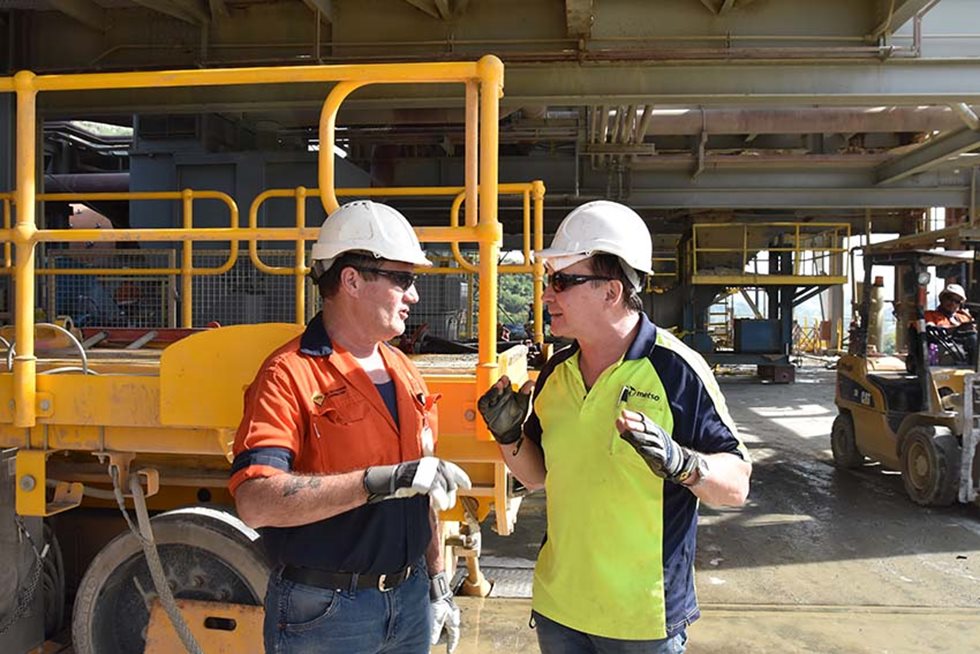 Two people talking to each others at Masbate site.