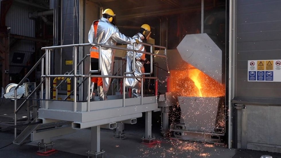 Molten green iron tapping ongoing