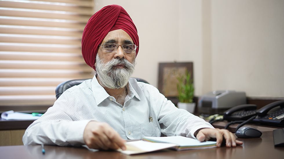 Mr. Manjeet Chawla, Director, Aman Sethi Group, pictured in an office. 