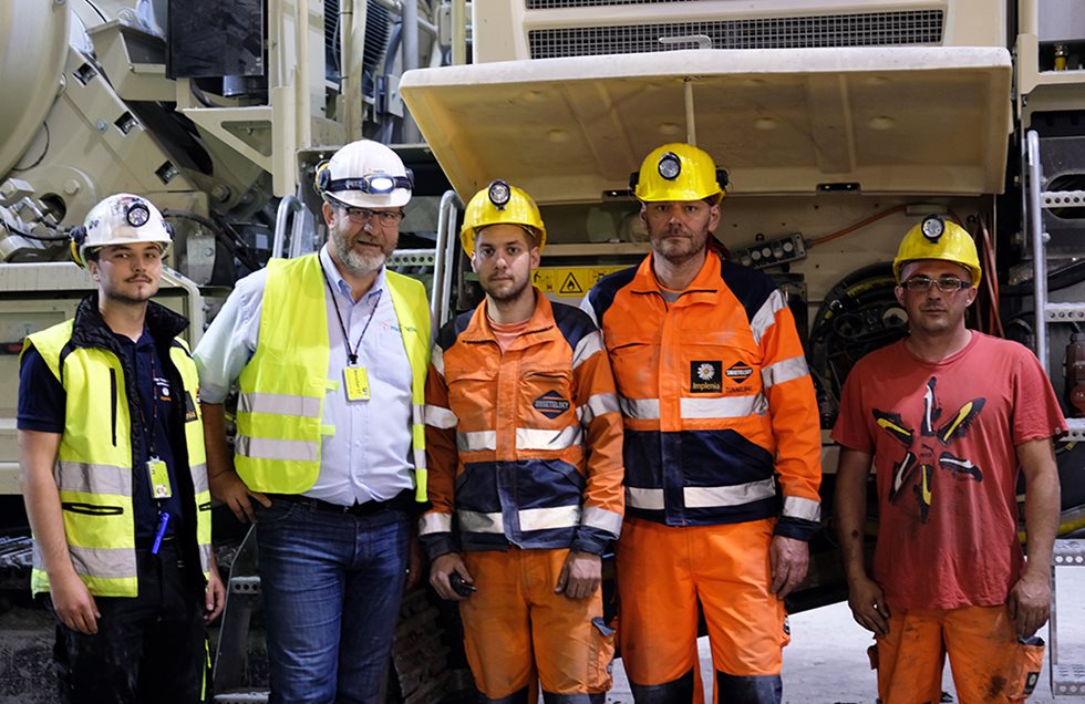 Five men standing in front of Lokotrack 