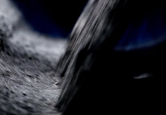 Conveyor belts moving material.